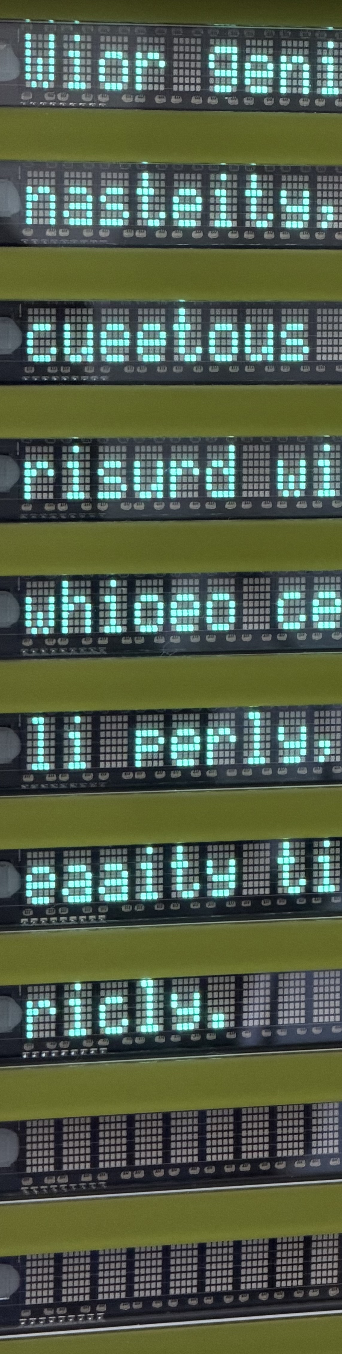 Croped image of green simgle line display screens with incorrect words displayed
